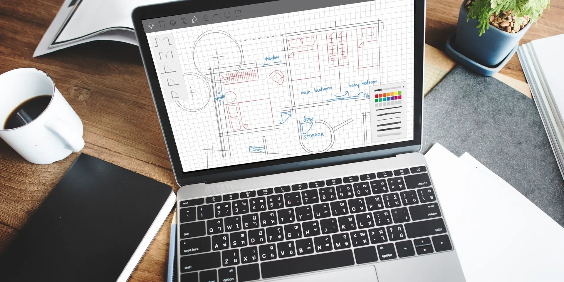 A laptop showing a half-built website alongside a developer's notebook with hand-drawn integration arrows, the operator-side work that gen-AI design tools still leave on the table